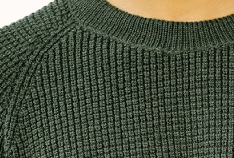 Textural knit stitch detail on a finished garment